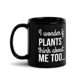 PLANTS THINK ABOUT ME Black Glossy Mug